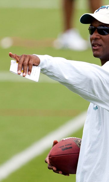 Karl Dorrell brings head coaching experience to Mason staff